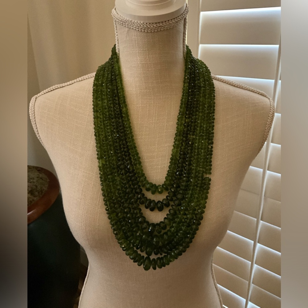 Multi-Strand Peridot necklace with 18KT Gold clasp with diamond accents.